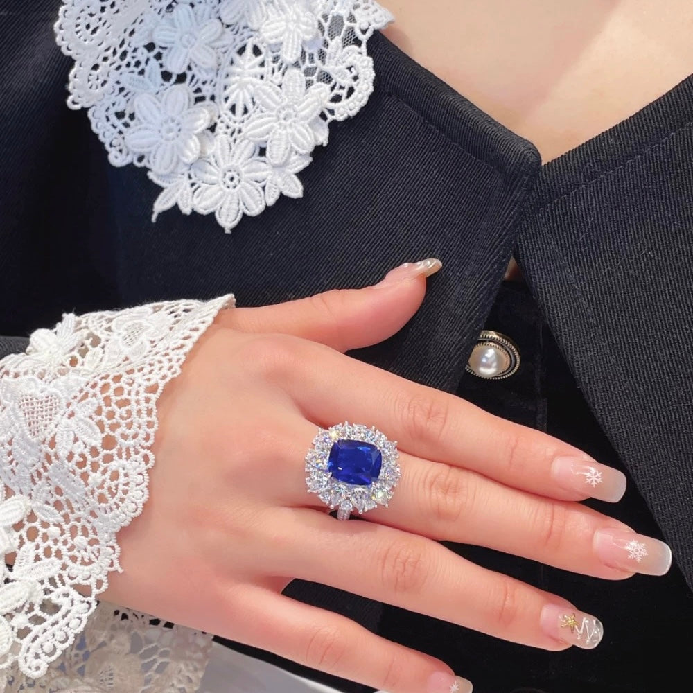 The Blue Danube Ring | 4ct Cushion Cut Created Royal Blue Sapphire Halo Ring in 18K Gold Vermeil