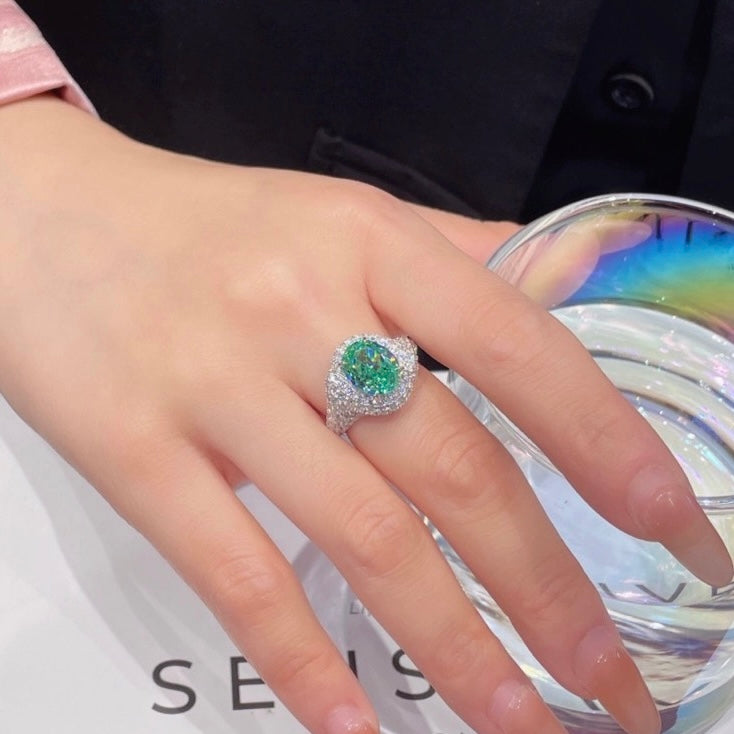 Aurora Glow Ring | 3.5ct Oval Cut Paraiba Coloured Zirconia Pave Halo Ring in 18k Gold Vermeil