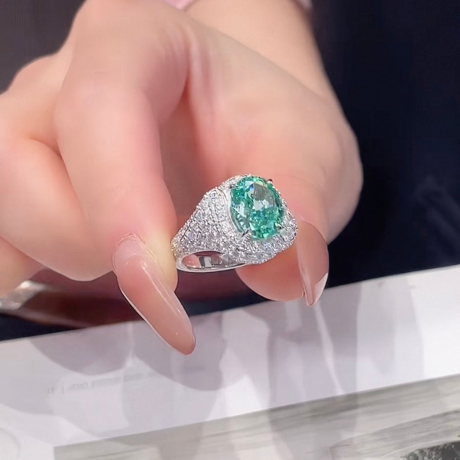 Aurora Glow Ring | 3.5ct Oval Cut Paraiba Coloured Zirconia Pave Halo Ring in 18k Gold Vermeil