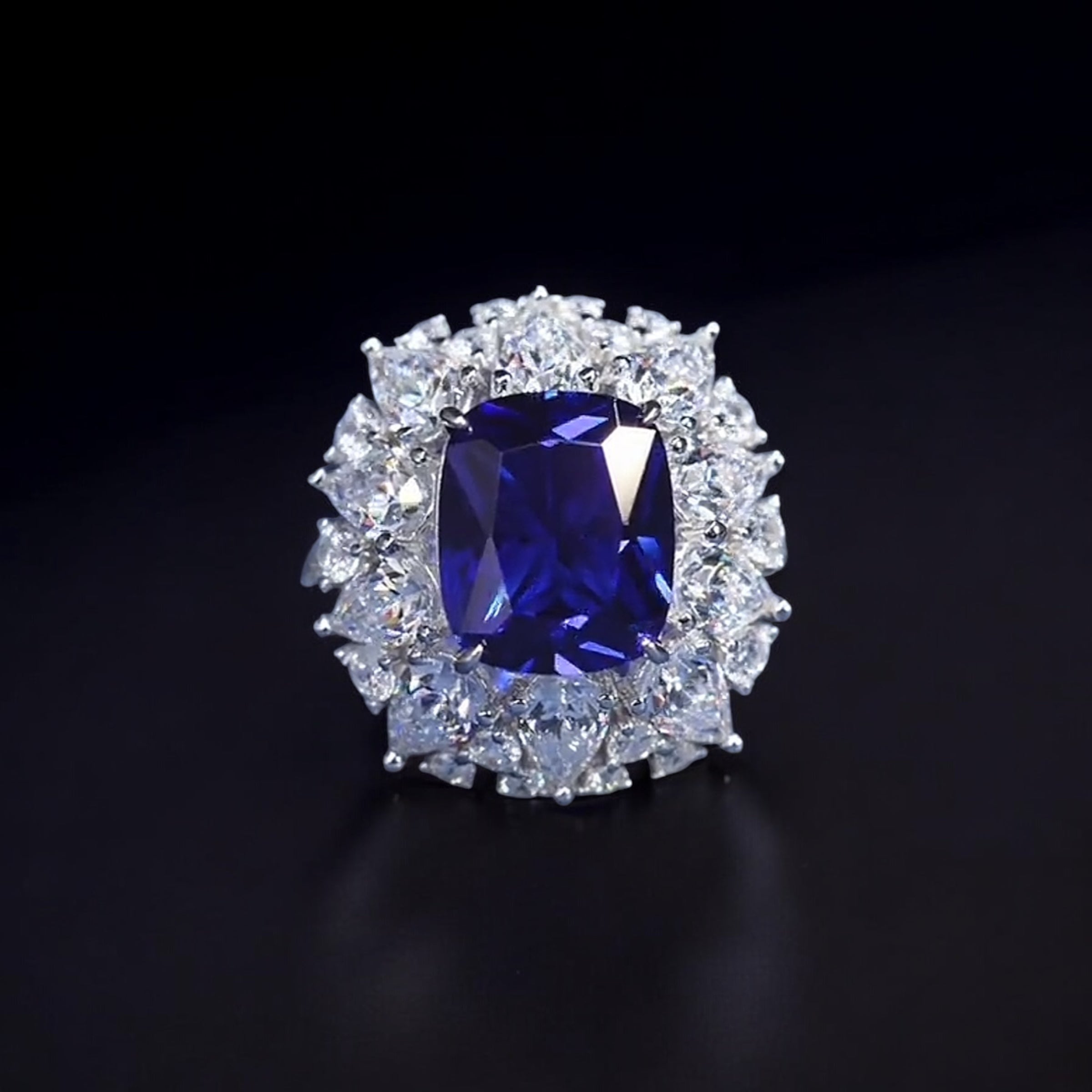 The Blue Danube Ring | 4ct Cushion Cut Created Royal Blue Sapphire Halo Ring in 18K Gold Vermeil