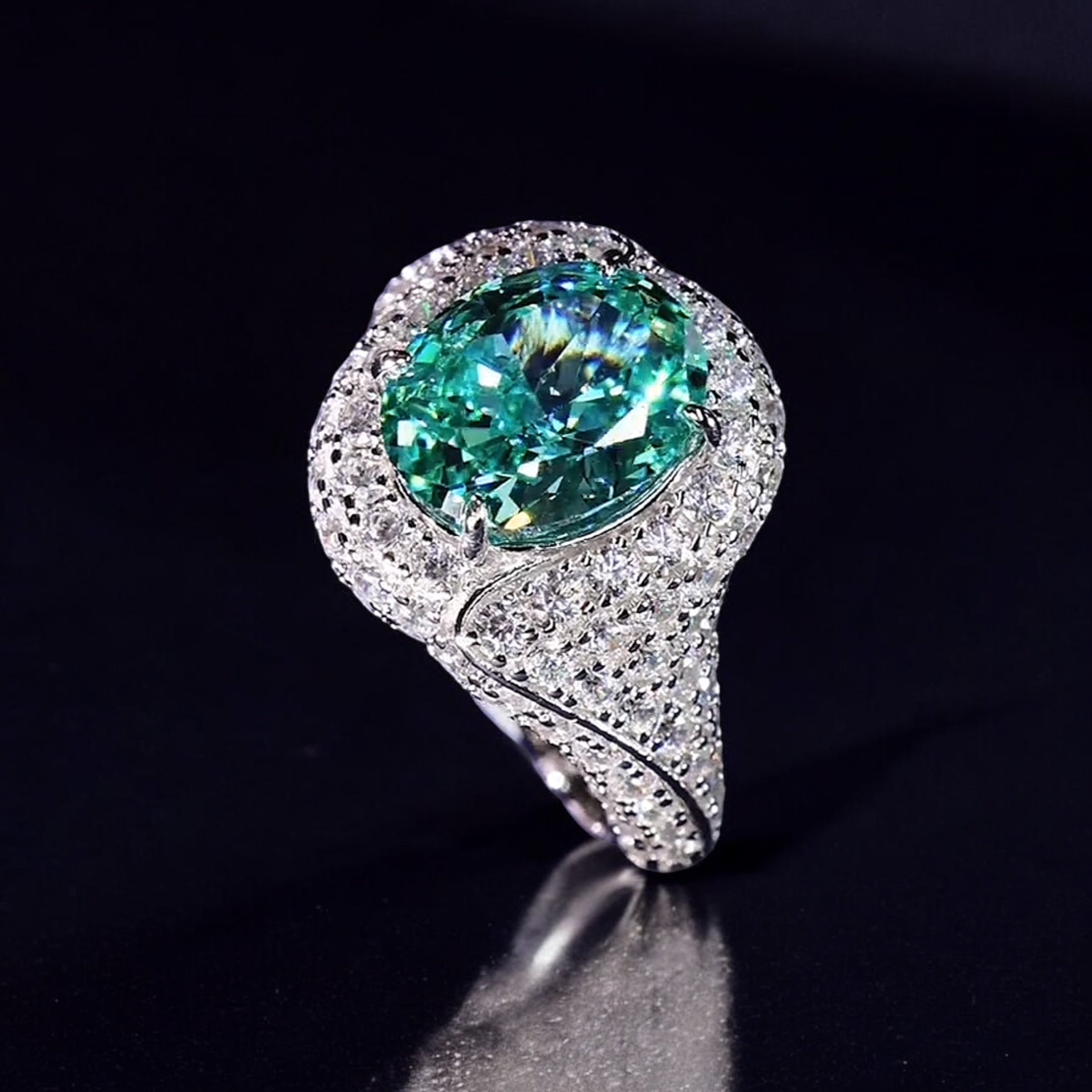 Aurora Glow Ring | 3.5ct Oval Cut Paraiba Coloured Zirconia Pave Halo Ring in 18k Gold Vermeil